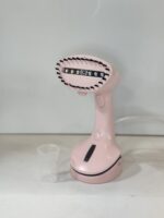 ⁦مكواة بخار يدوية محمولة من ماركة "Universal".⁩ - الصورة ⁦3⁩